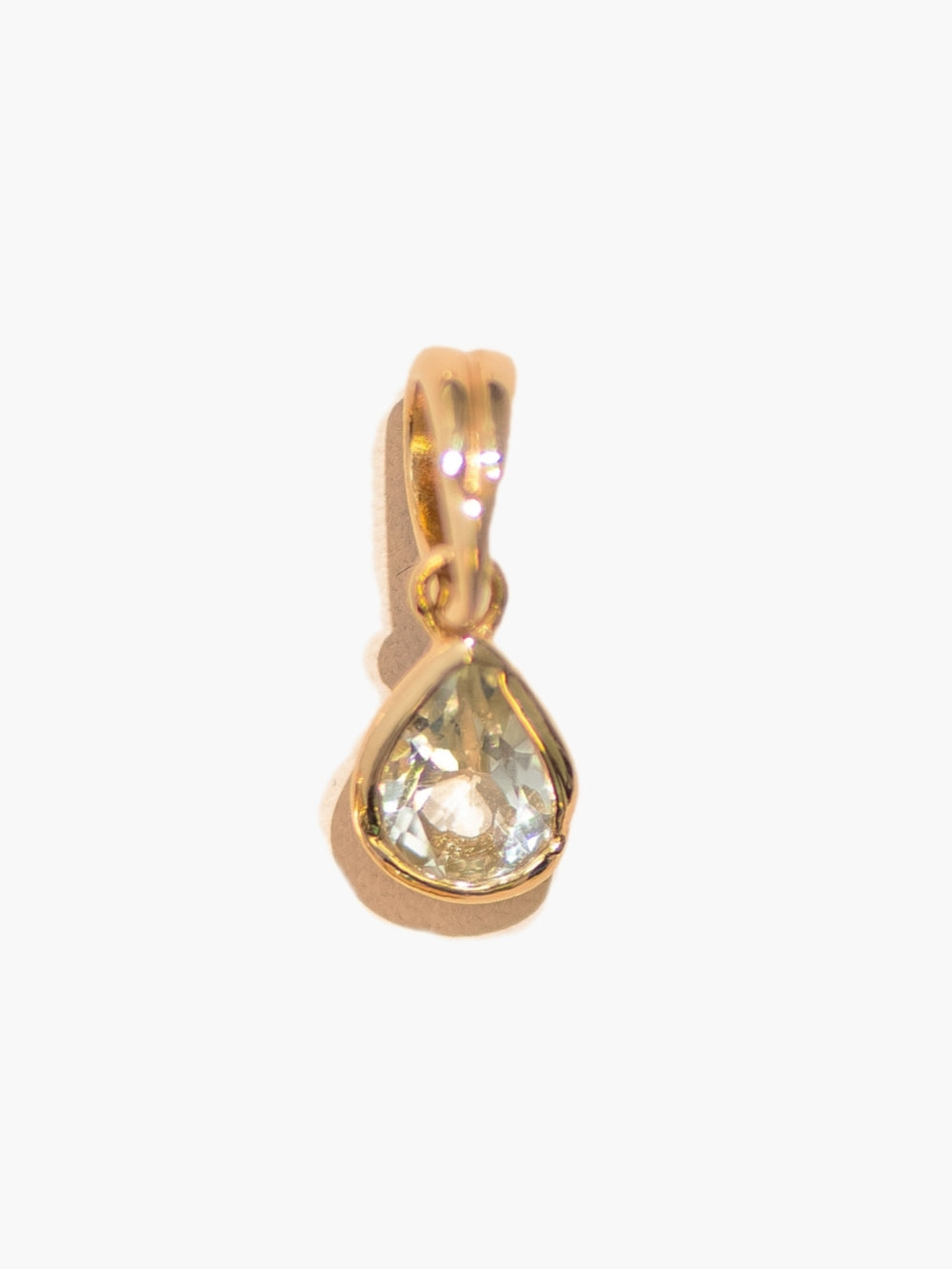 Rizen Jewelry Green Quartz Fully Known Prayer Pendant cradled in an 18 karat gold plated finish close-up. 