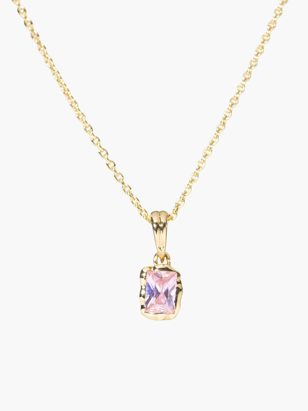 Light pink fully known prayer pendant featured on a sleek gold cable chain by Rizen Jewelry. 
