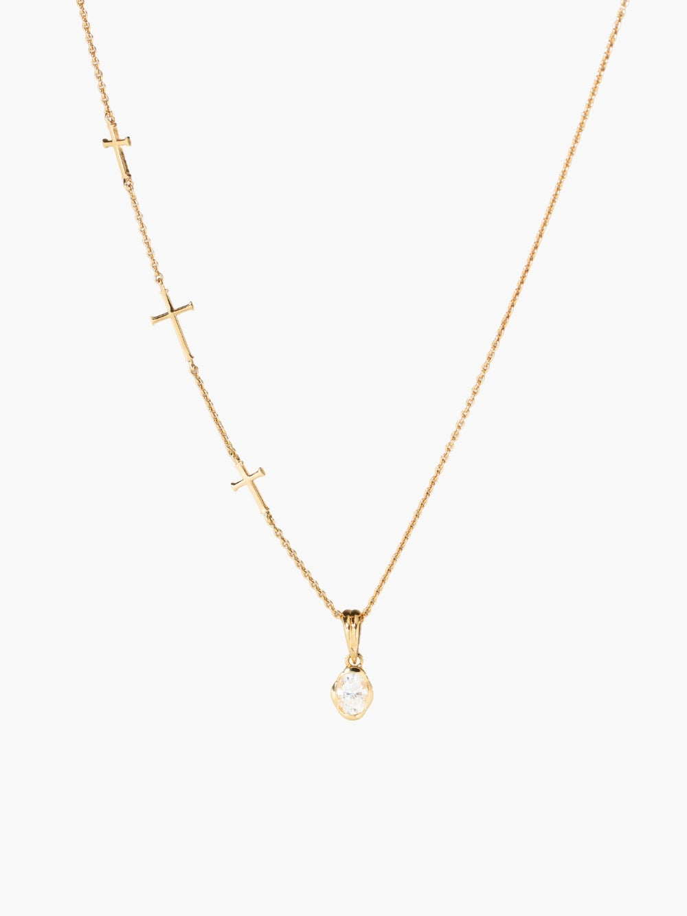 Calvary cross necklace shown styled with the Calvary cross necklace shown styled with the White Sapphire Fully Known Prayer Pendant by Rizen Jewelry features A radiant oval brilliant-cut white sapphire pendant, reflecting innocence, our new identity, and the luminous pure heart of April, cradled gently in refined 18k gold plating over sterling silver. 