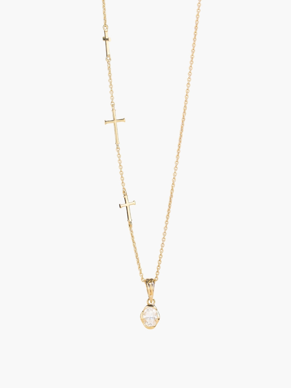 Calvary cross necklace styled with the White Sapphire Fully Known Prayer Pendant by Rizen Jewelry features A radiant oval brilliant-cut white sapphire pendant, reflecting innocence, our new identity, and the luminous pure heart of April, cradled gently in refined 18k gold plating over sterling silver. 