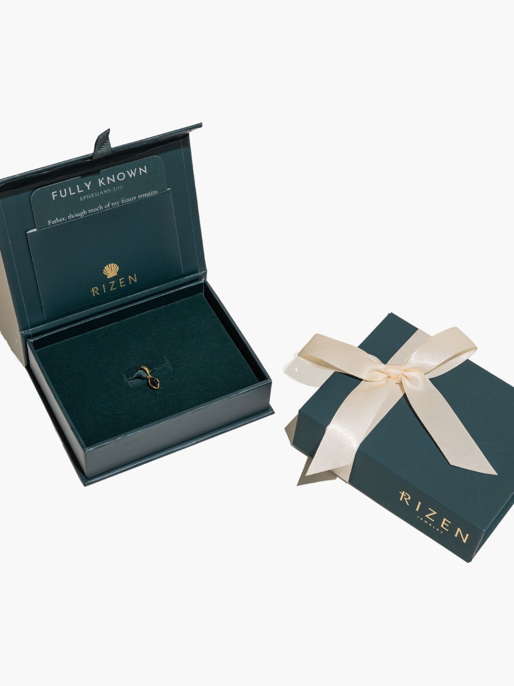 Ready to gift the London Blue Topaz Fully Known Pear Pendant by Rizen Jewelry in their signature packaging. 