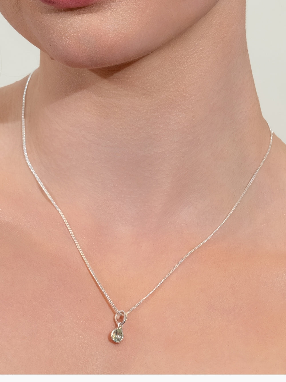 Rizen Jewelry Green Quartz Fully Known Prayer Pendant in Sterling Silver on a women's Christian jewelry model 