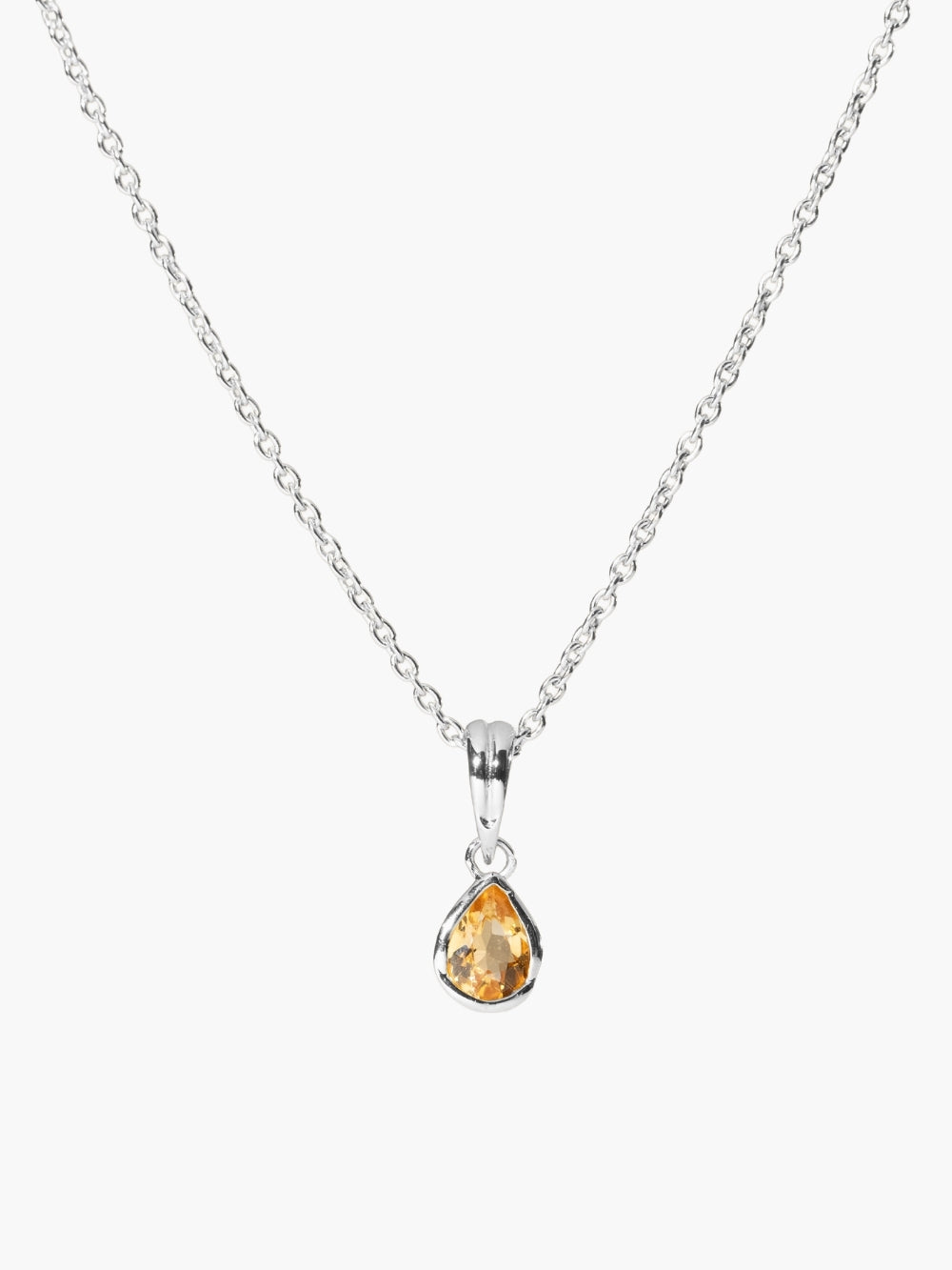 A pear-cut light citrine stone is cradled in a sterling silver setting. The pendant symbolizes wisdom, truth, guidance, and the month of November featured on a silver cable chain 