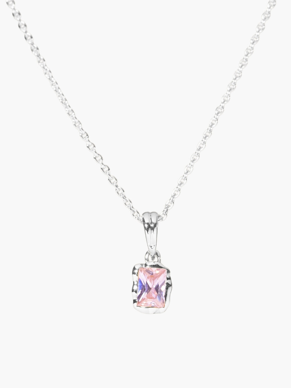 Light Pink Fully Known Prayer Pendant by Rizen Jewelry features a radiant emerald cut light pink cz pendant, reflecting love, joy,&nbsp; and the compassionate heart of October, cradled gently in sterling silver. Featured on a K.L. chain 