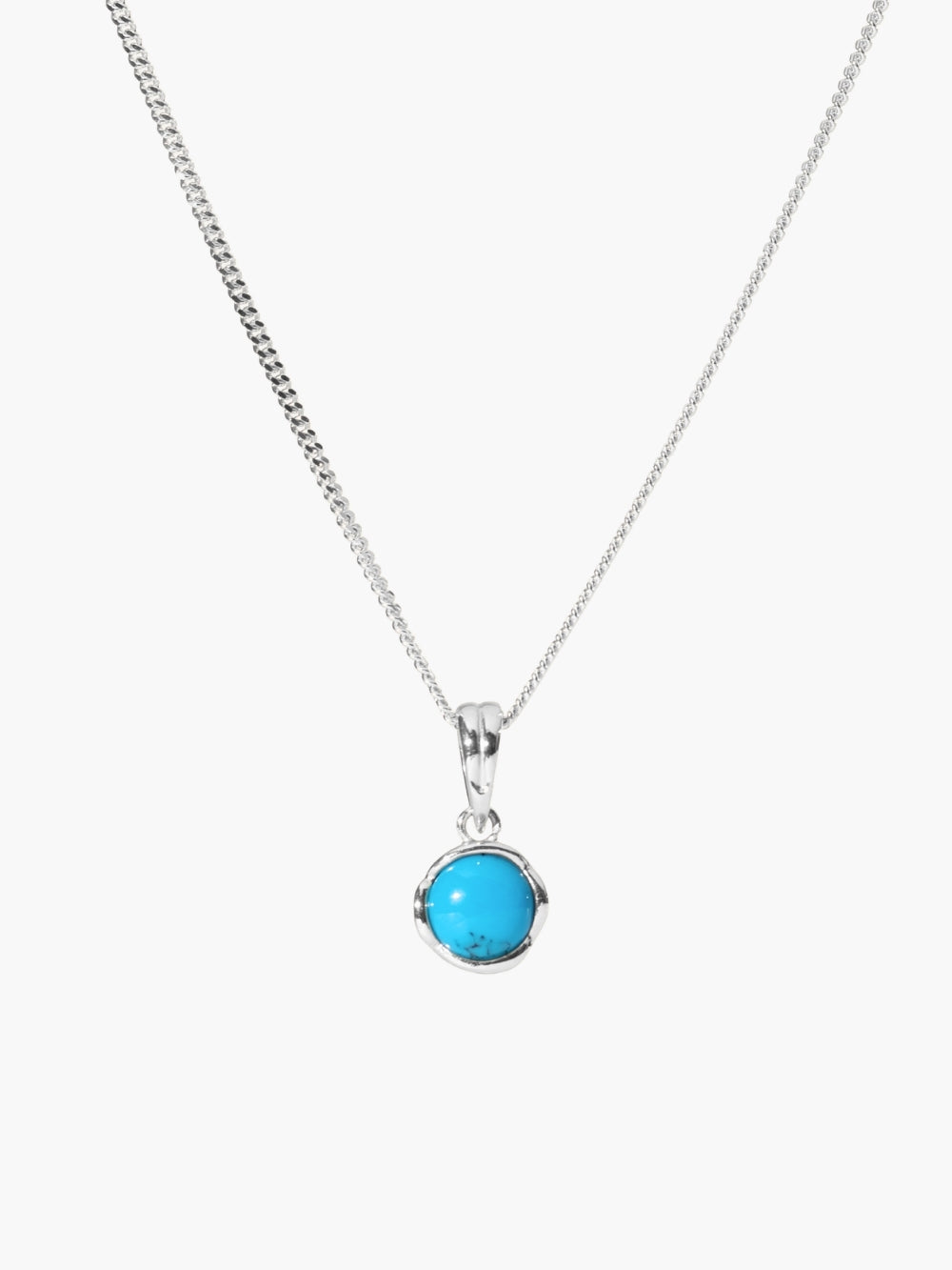 Turquoise Fully Known Prayer Pendant by Rizen Jewelry features a Turquoise Fully Known Prayer Pendant by Rizen Jewelry features a round cabochon turquoise stone  cradled in a  sterling silver setting. The pendant symbolizes Restoration, Leadership, Favor, and the month of December. Featured on a sleek curb chain. 