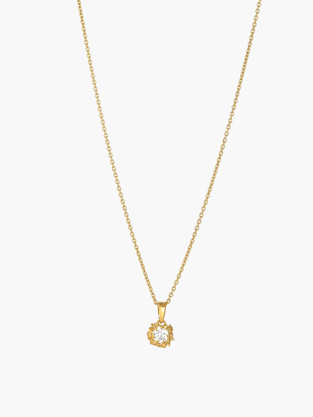 Rizen Jewelry Crown of Thorns pendant in 18-karat gold finish. The Crown of Thorns intricately nestles a round brilliant cut cubic zirconia in the center. Featured on a dainty cable chain necklace.