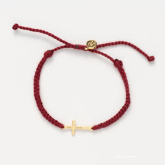 Christian gold cross bracelet engraved "STAY SALTY" hand braided garnet red cotton cords by Rizen Jewelry Made 4 Ministries collection. 