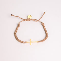 Cross bracelet engraved STAY SALTY set on a naturally dyed khaki hand-braided, cotton cord friendship bracelet with a gold or sterling silver finish from the Made4Ministry Collection by Rizen Jewelry. 