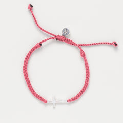 Cross bracelet engraved STAY SALTY set on a naturally dyed pink dusty rose hand-braided, cotton cord friendship bracelet with a gold or sterling silver finish from the Made4Ministry Collection by Rizen Jewelry. 