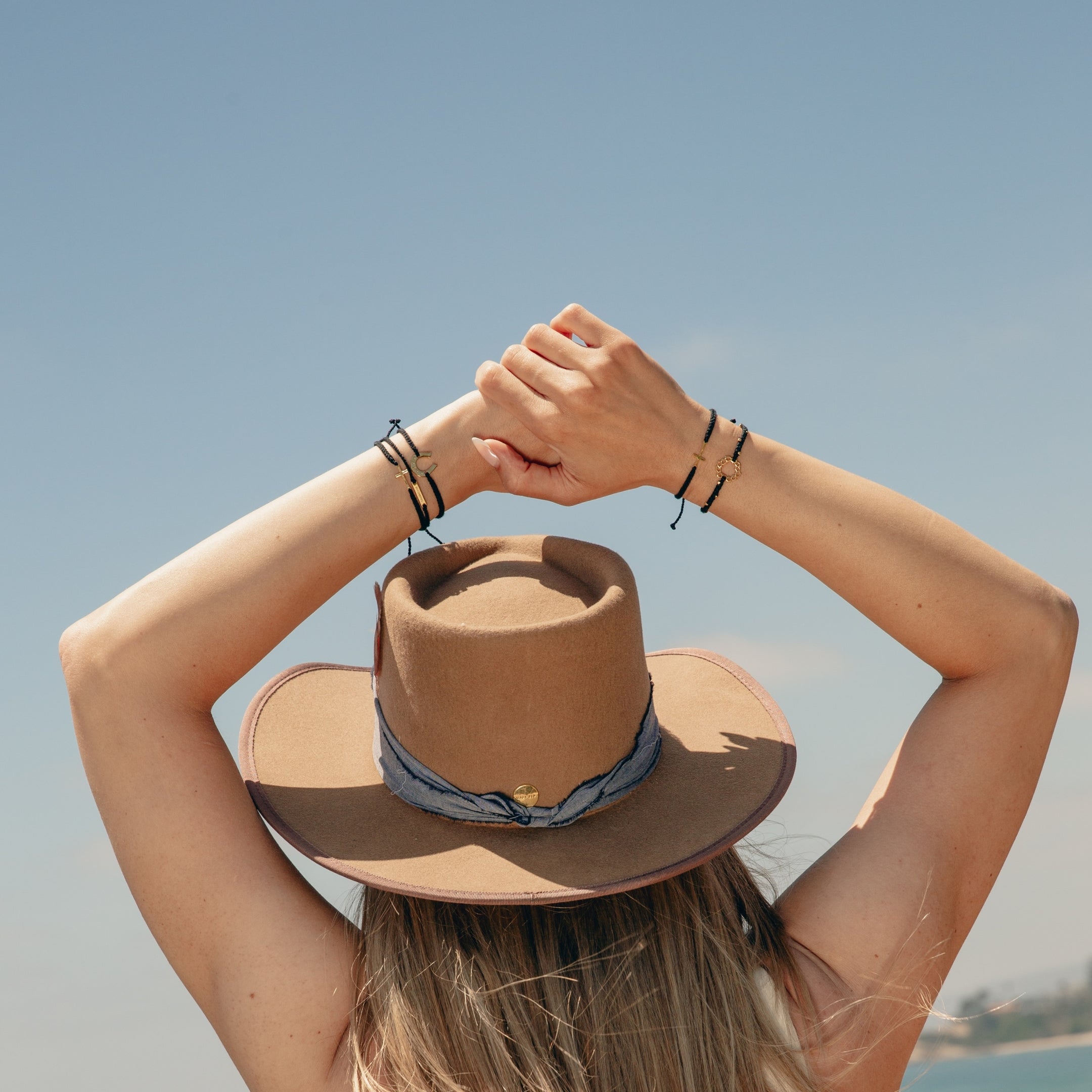 Free spirited country woman wearing the inspirational Made4Ministry friendship bracelets  by Rizen Jewelry. 