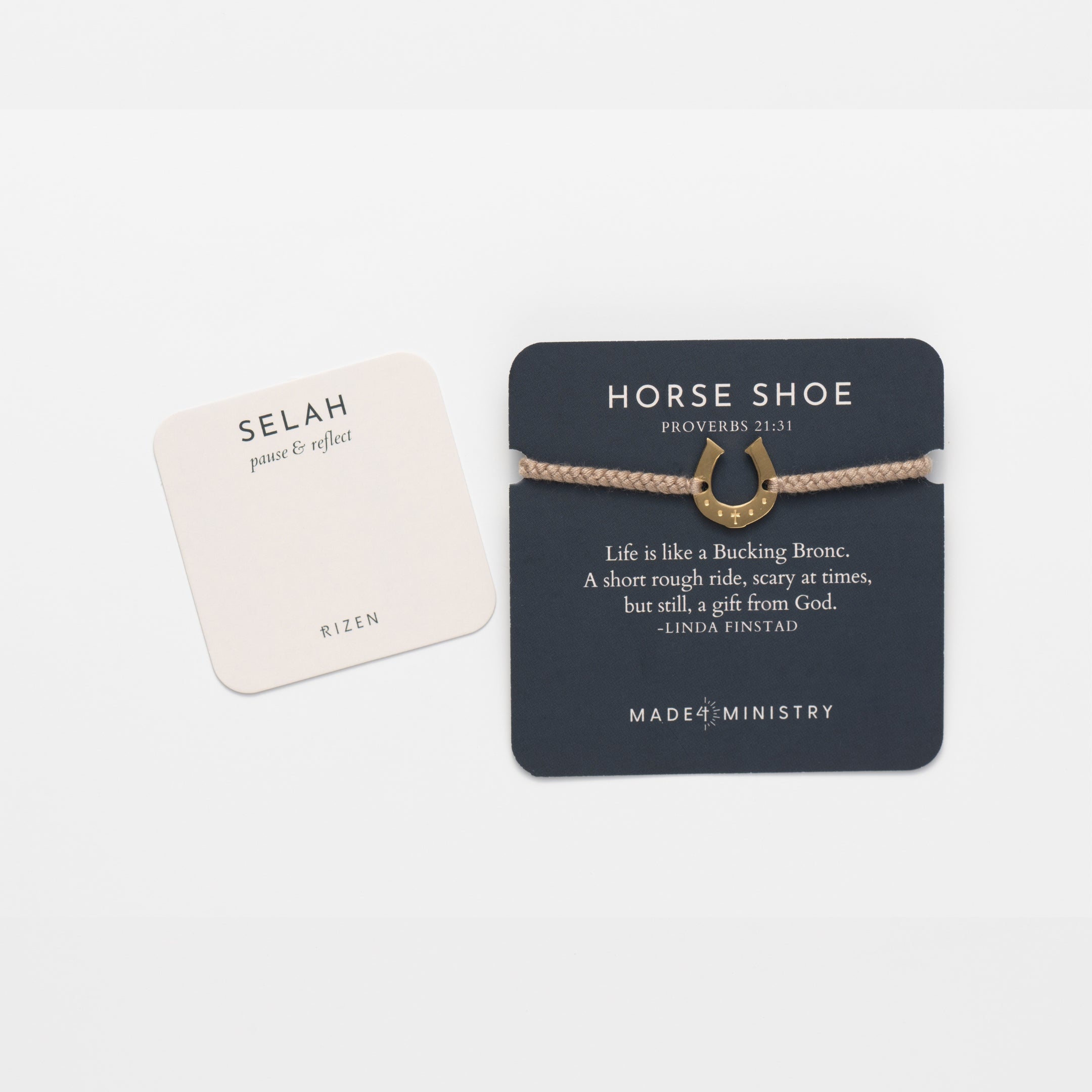 Horseshoe bracelet engraved with a cross set on a naturally dyed khaki hand-braided, cotton cord friendship bracelet. Available in 18k Gold and Sterling Silver finish. Featured on a Devotion card with a mini  prayer card from the Made4Ministry Collection by Rizen Jewelry.