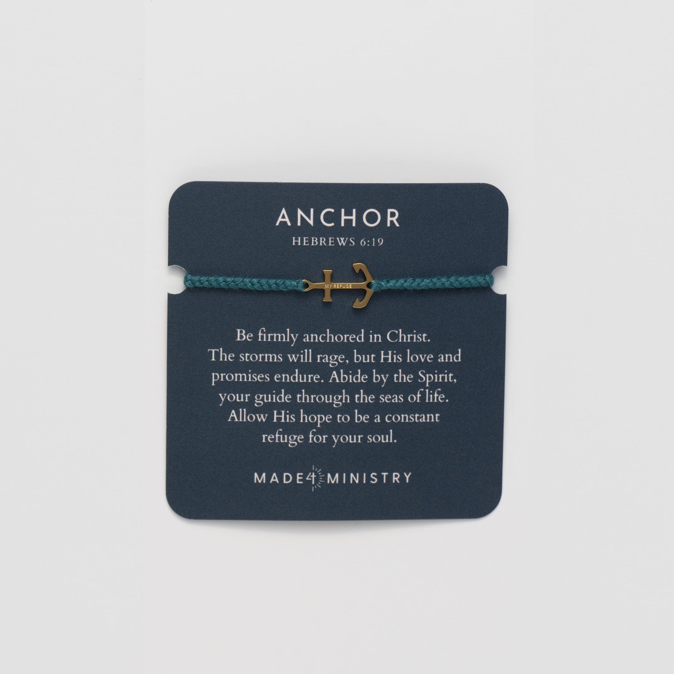 Classic nautical anchor bracelet, delicately engraved with the inscription “MY REFUGE,” hand-braided from naturally dyed azure blue cotton cord. Available in 18k gold or sterling silver finish from the Made4Ministry Collection by Rizen Jewelry.  Featured on the inspirational devotion card. 