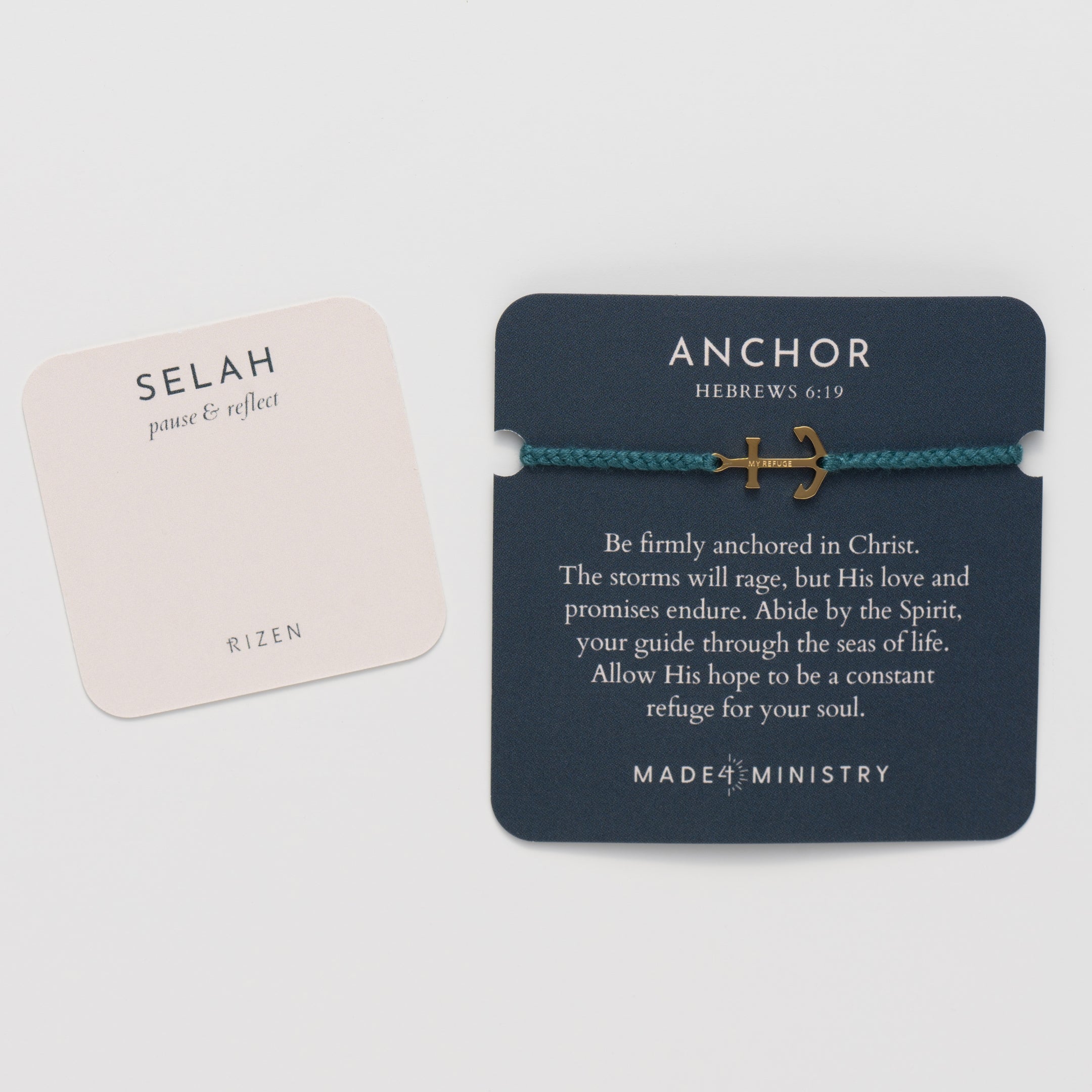 Classic nautical anchor bracelet, delicately engraved with the inscription “MY REFUGE,” hand-braided from naturally dyed azure blue cotton cord. Available in 18k gold or sterling silver finish from the Made4Ministry Collection by Rizen Jewelry featured on the devotion card with the prayer card. 