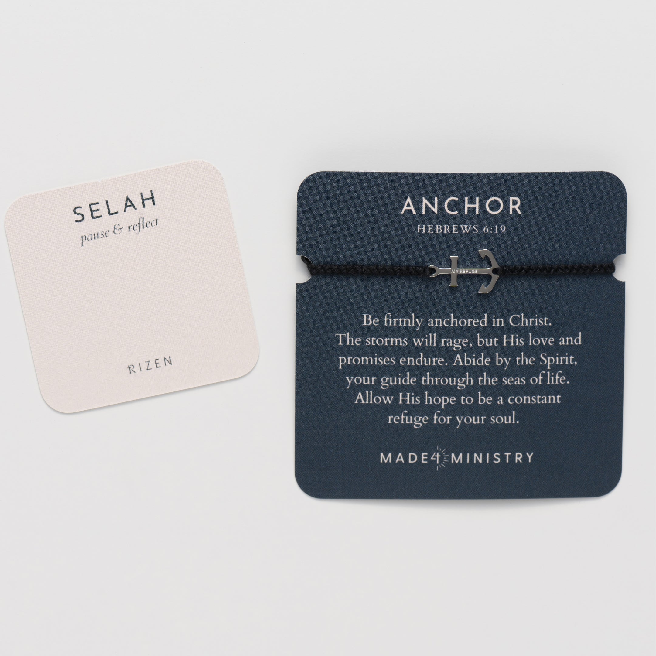 Classic nautical anchor bracelet, delicately engraved with the inscription “MY REFUGE,” hand-braided from naturally dyed black cotton cord. Available in 18k gold or sterling silver finish from the Made4Ministry Collection by Rizen Jewelry.  Featured on the inspirational devotion card with prayer card. 