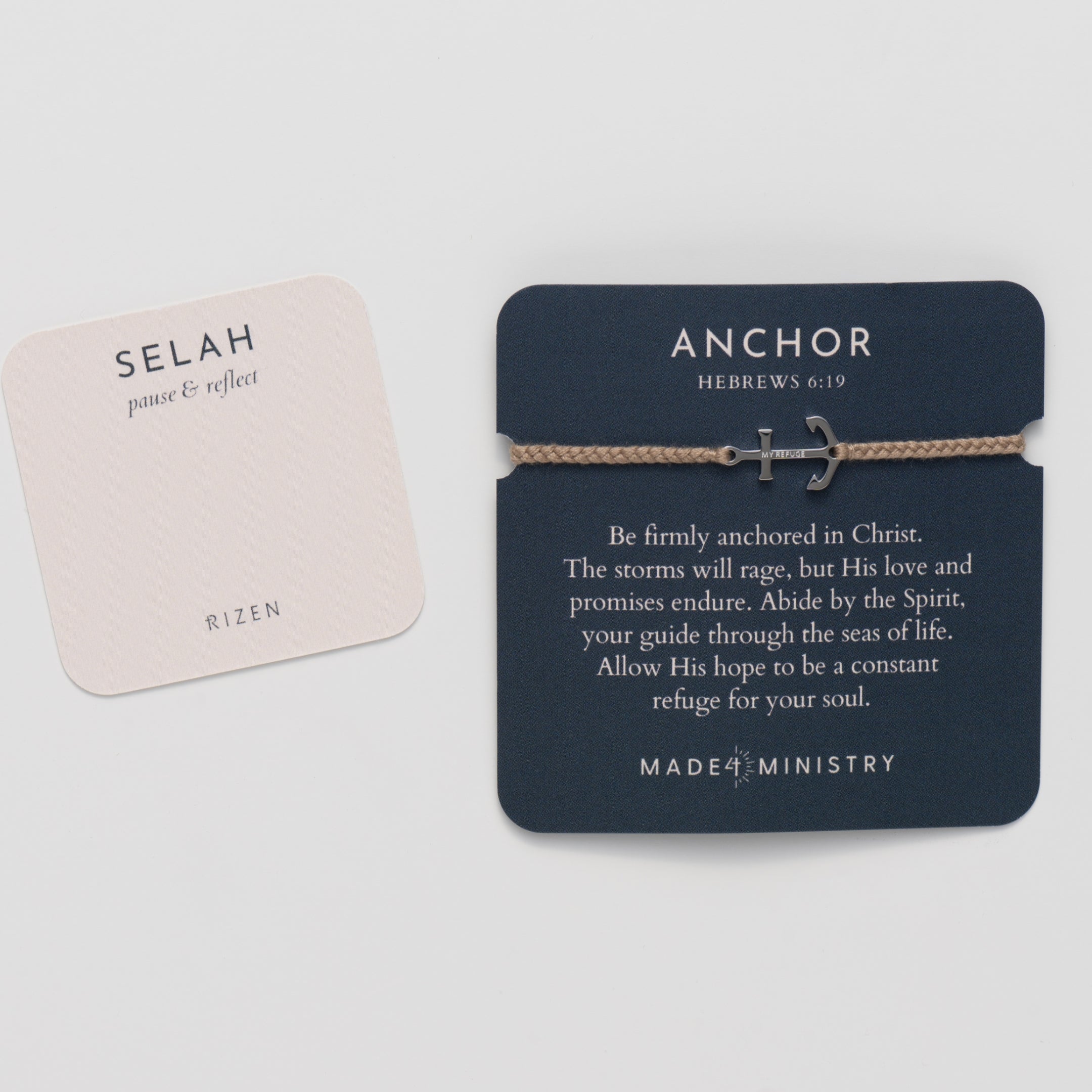 Gold anchor set on a khaki friendship bracelet with the engraving MY REFUGE from the Made4Ministry collection by Rizen Jewelry on an inspirational devotion card with the prayer card. 