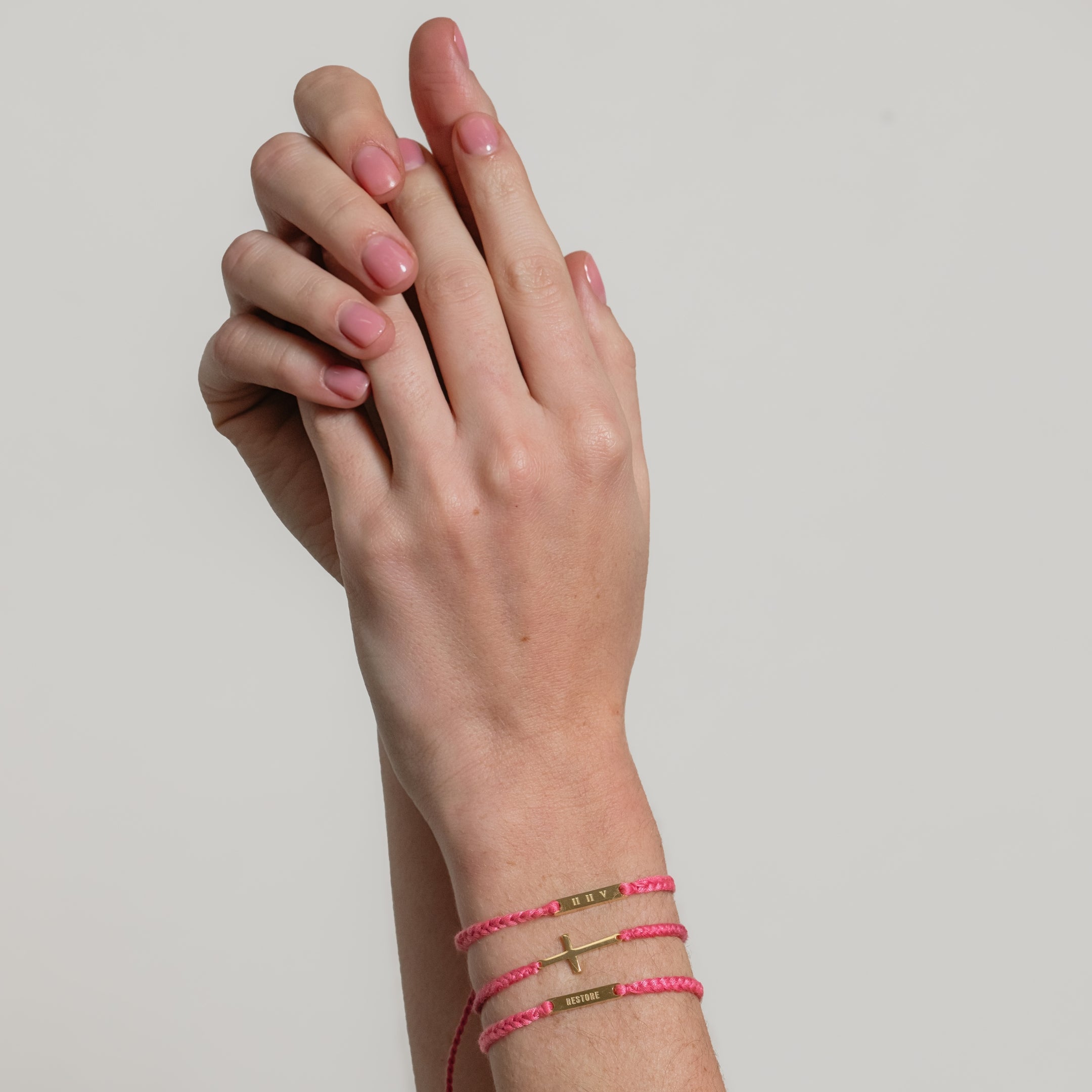 Loved Dusty Rose Cross Braided Bracelet