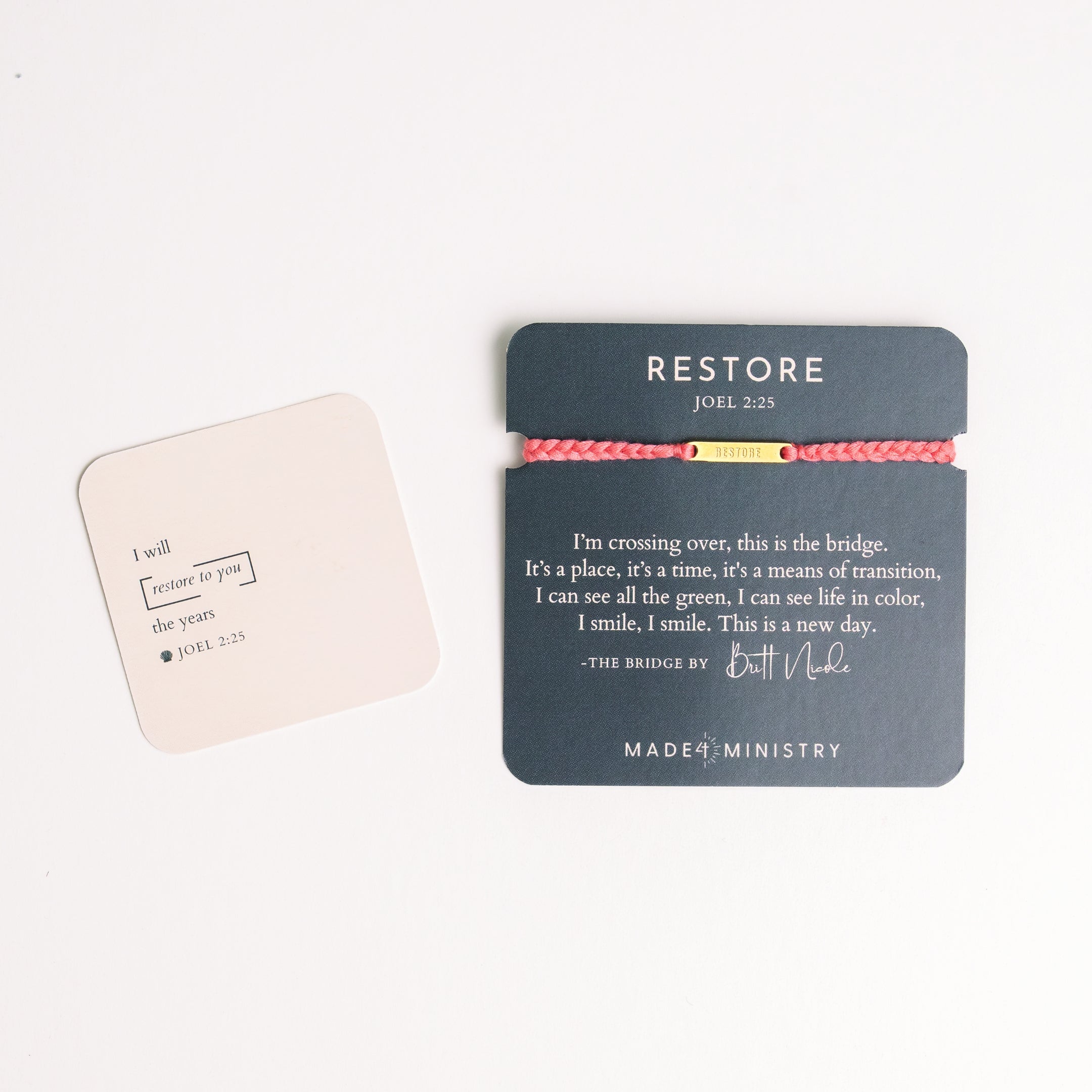 Restore Made4Ministry pink dusty rose cord bracelet x Britt Nicole from her new album IIV featuring the verse Joel 2:25. The gold bar pendant is engraved RESTORE on the front and IIV on the back. 
