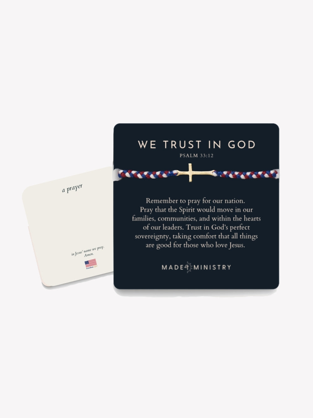 Cross friendship bracelet engraved "We Trust In God" with red, white, and blue braided cords from the Made4Ministry collection by Rizen Jewelry, licensed by Freedom 250. Featuring the prayer card and devotion card. 