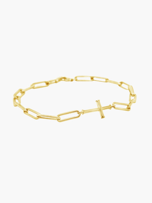 Chain breaker cross bracelet in 18k gold plated from the Calvary collection.  A timeless baptism gift by Rizen Jewelry.