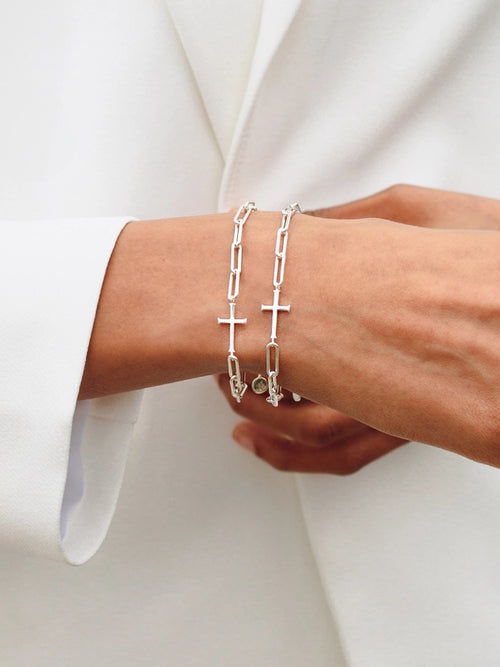 Two Chain breaker cross bracelet in sterling silver from the Calvary collection. A timeless baptism gift by Rizen Jewelry.