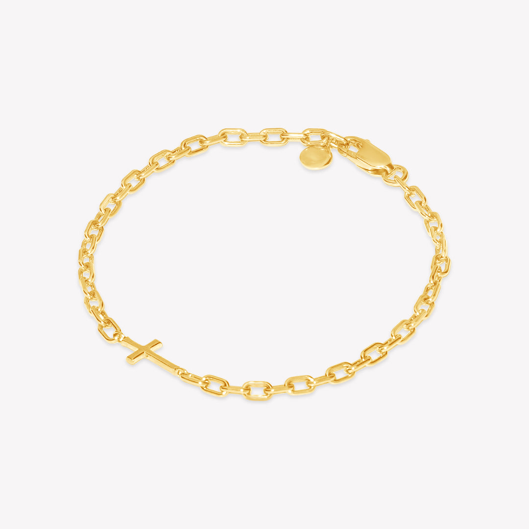 Mini Chain Breaker Cross Bracelet in 18k gold vermeil from the calvary collection by Rizen Jewelry. 