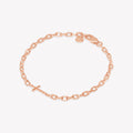 Mini Chain Breaker Cross Bracelet in 18k rose gold plated from the Calvary collection. Inspirational Faith Jewelry for Women by Rizen Jewelry.

