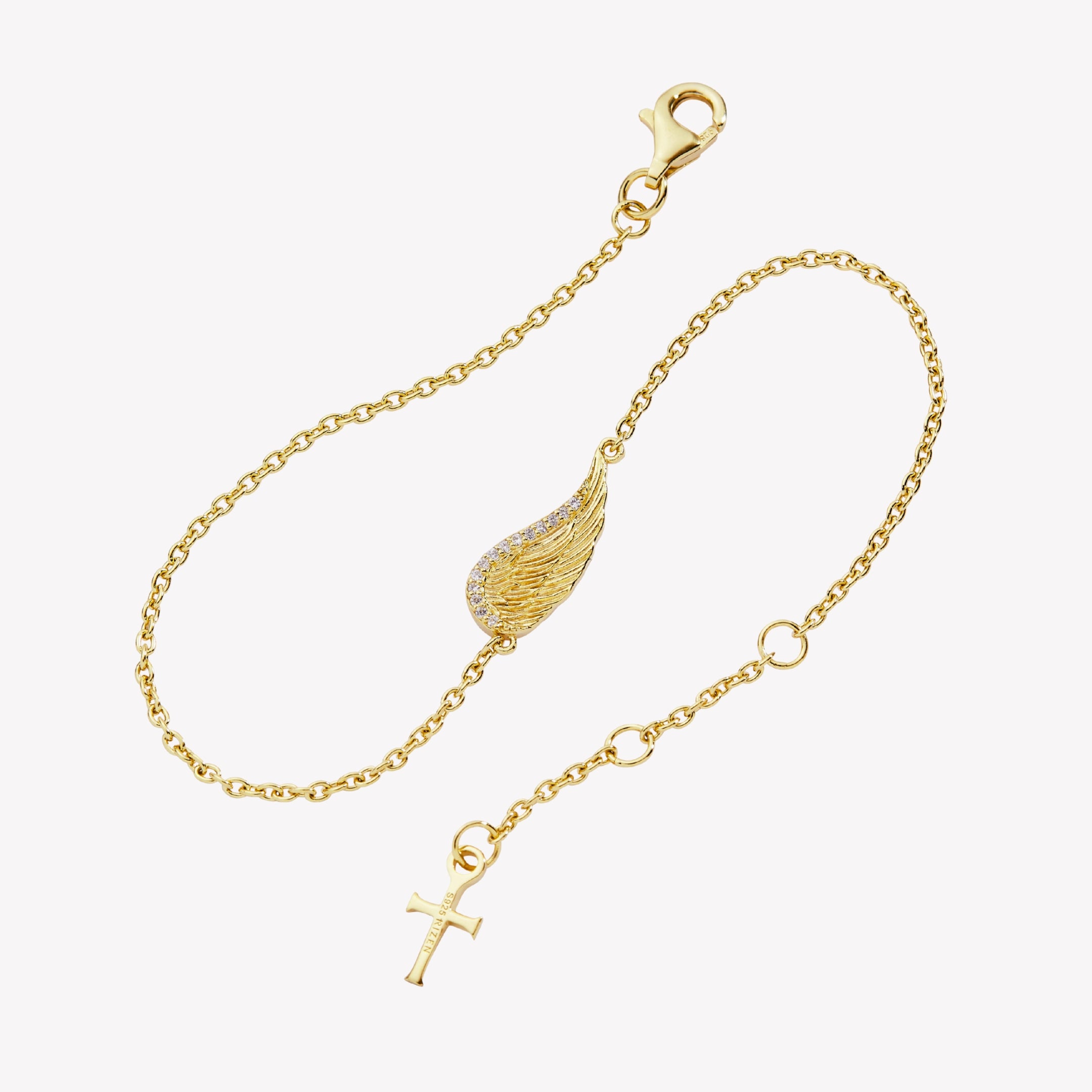 18k gold plated bracelet featuring the divine angel wing motif highly polished with cubic zirconia stone accents on a cable chain with a dainty cross tag by Rizen Jewelry.