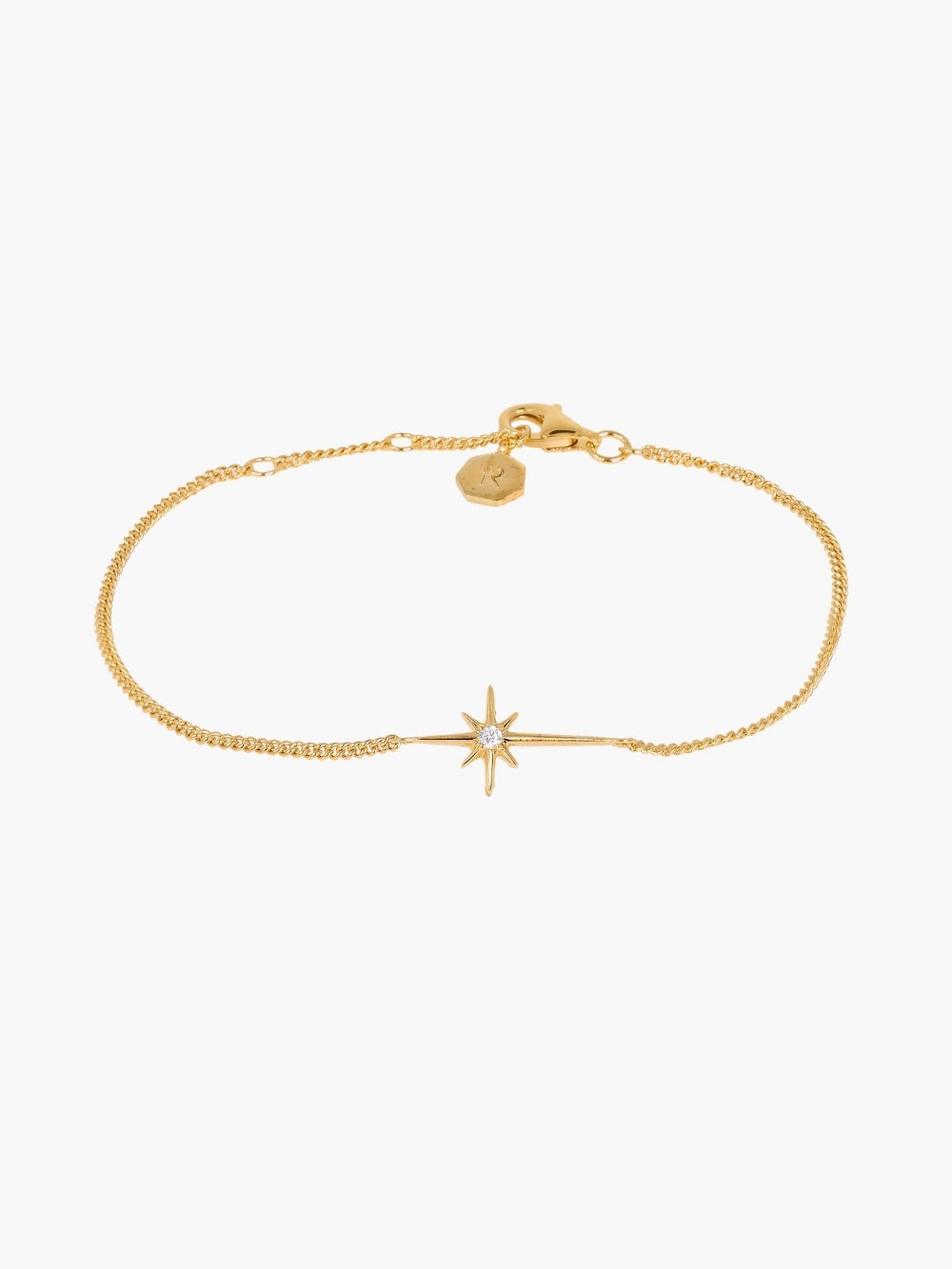 Adoring Star Bracelet with star-cross charm and cubic zirconia on gold curb chain, from the insignia collection designed by Rizen Jewelry.