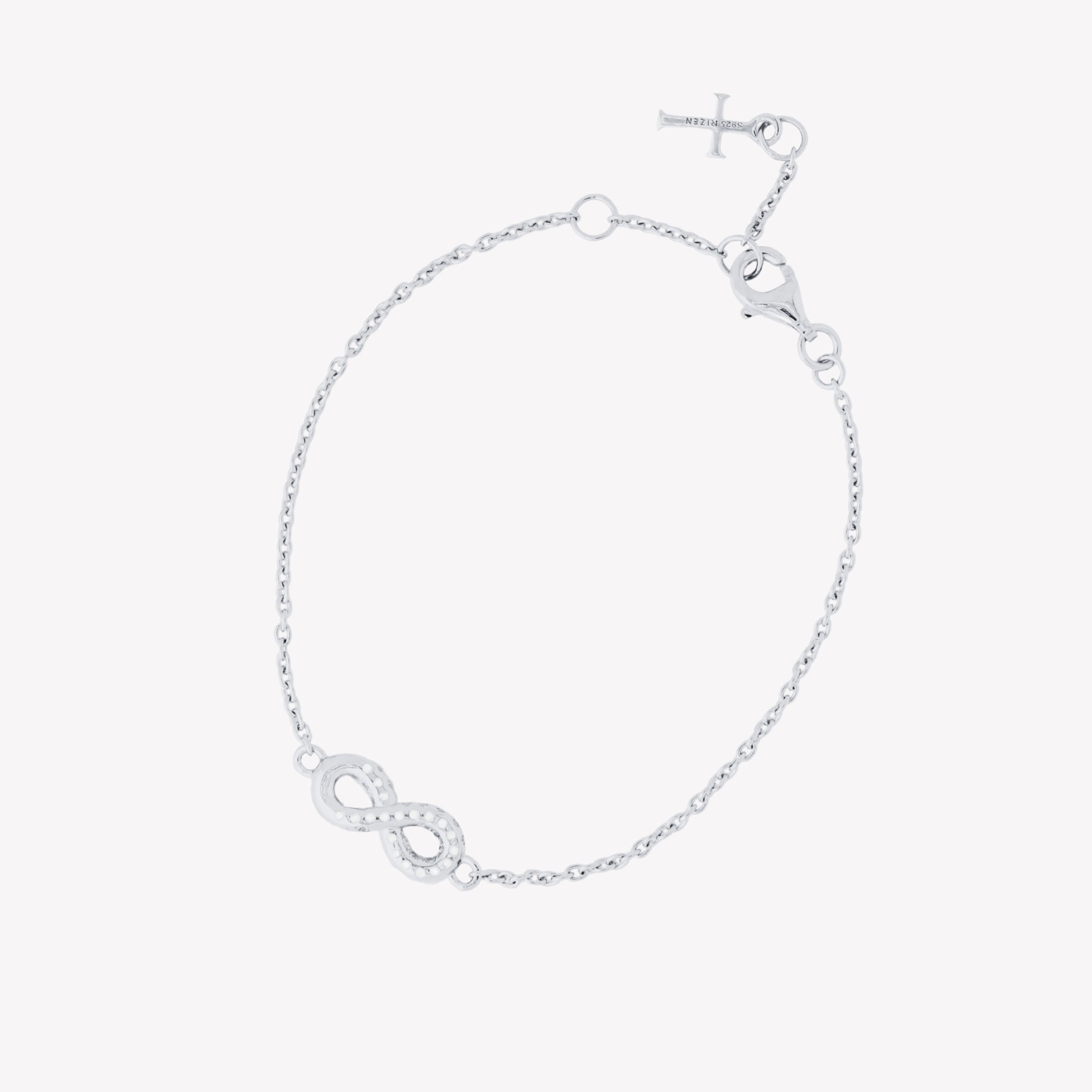 radiant sterling silver Infinite Hope braccelet showcases a pavé zirconia ichthys nestled within an infinity pendant designed by Rizen Jewelry. 