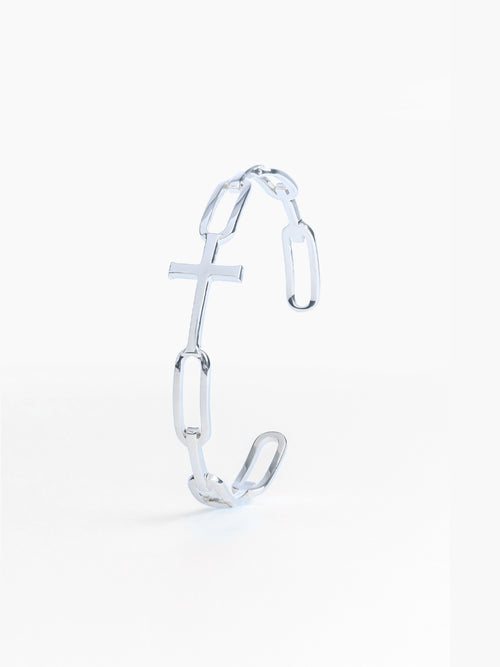 Chain Breaker Cross Cuff Bangle Bracelet is a Sterling silver bold yet sleek cuff bangle that beautifully expresses one’s faith, featuring striking links seamlessly transitioning into the classic Rizen Cross.