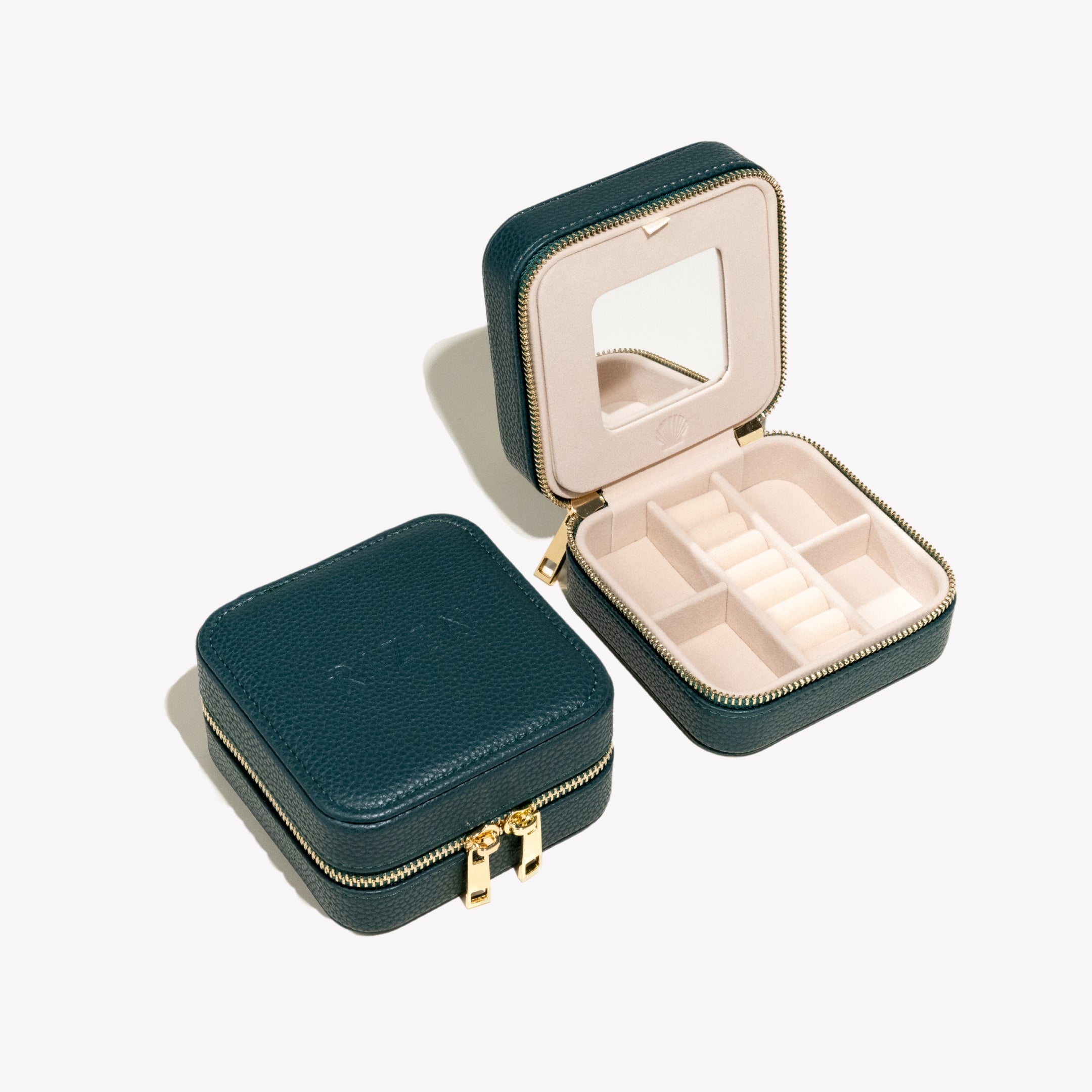 Depth teal green Rizen Jewelry box with mirror and bottom storage for rings, earrings, bracelets shown all with off white velvet interior. 
