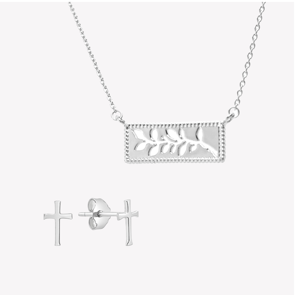 Close up the Olive Branch Necklace and mini Cross Earrings Set in sterling silver from the Rooted Collection by Rizen Jewelry. 