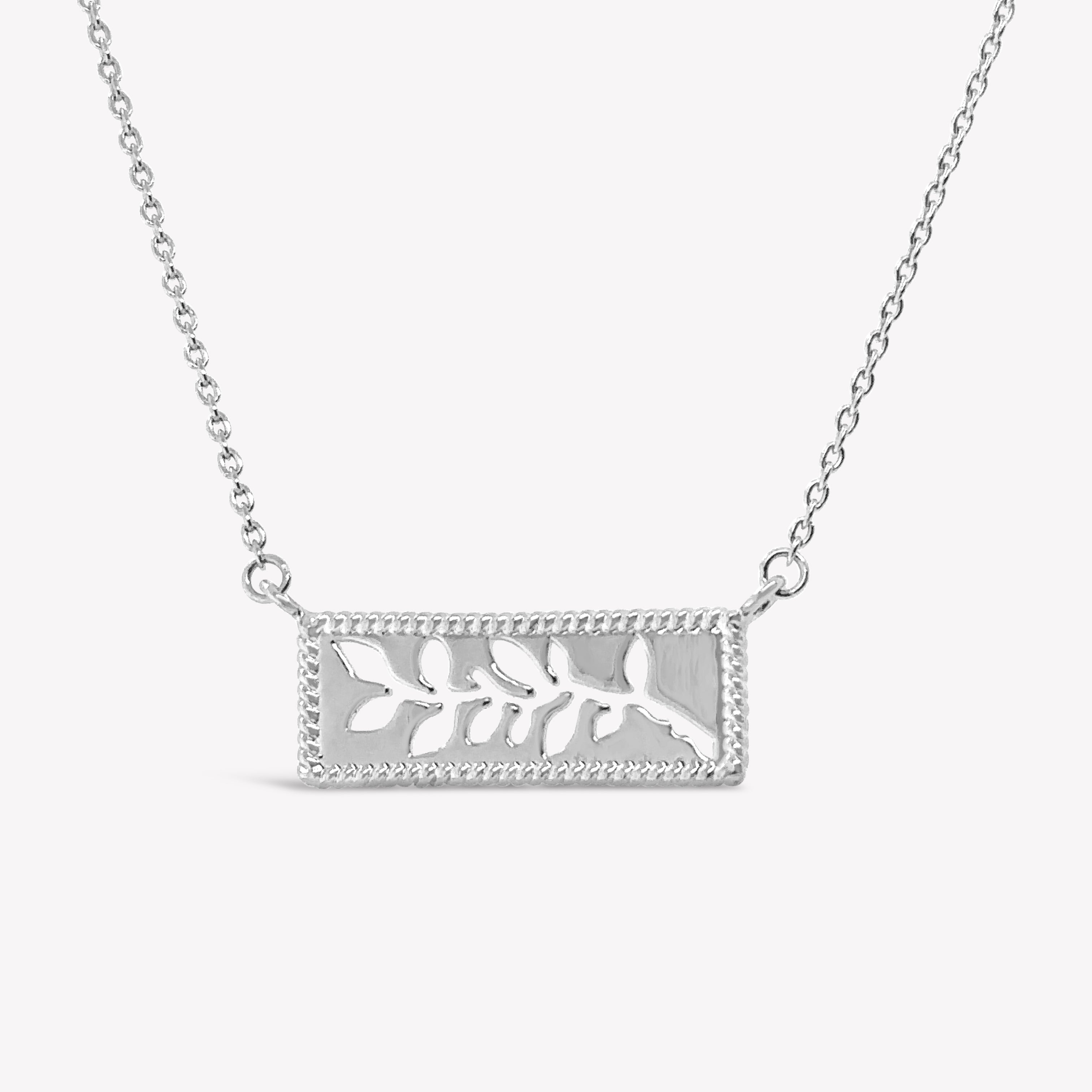 Close up of the intricately designed sterling silver Olive Branch Necklace from the Rooted Collection by Rizen Jewelry.