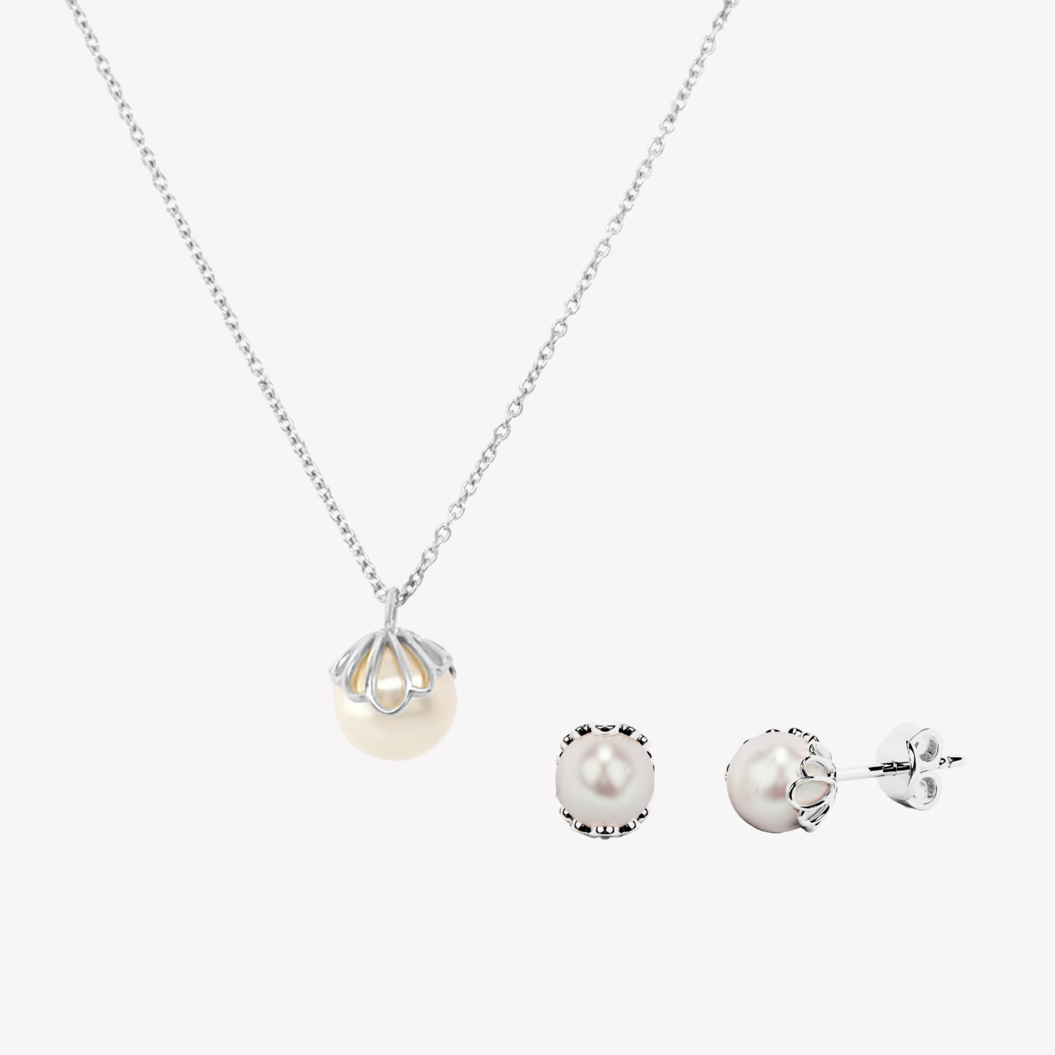 Sterling silver Becoming Necklace Earring Gift Set featuring the scallop shell encased pearl necklace and earrings.
