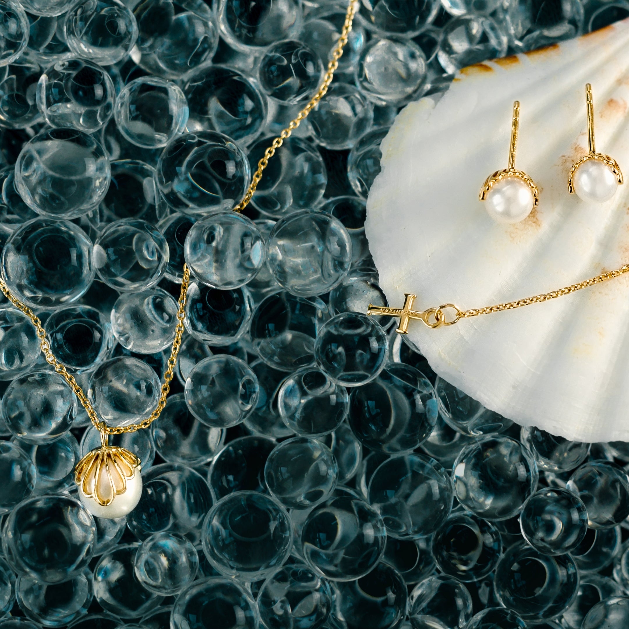 Becoming Necklace Earring Gift Set in 18k yellow gold vermeil featuring the natural freshwater pearl shell encased necklace and earrings by Rizen jewelry 