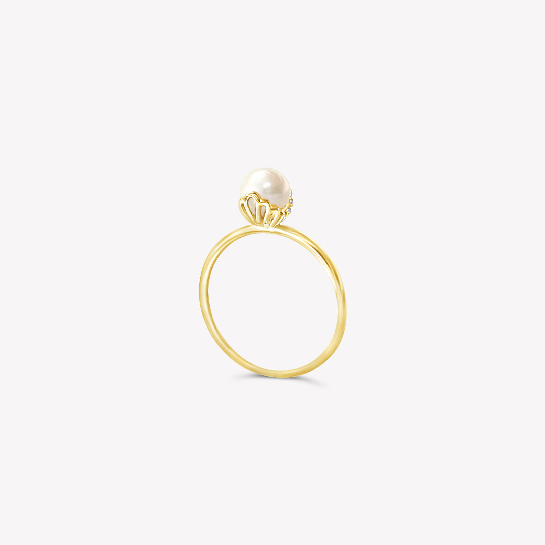 Rizen Jewelry shell encased pearl ring in gold vermeil from he Becoming Collection. 
