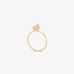 Rizen Jewelry shell encased pearl ring in gold vermeil from he Becoming Collection.