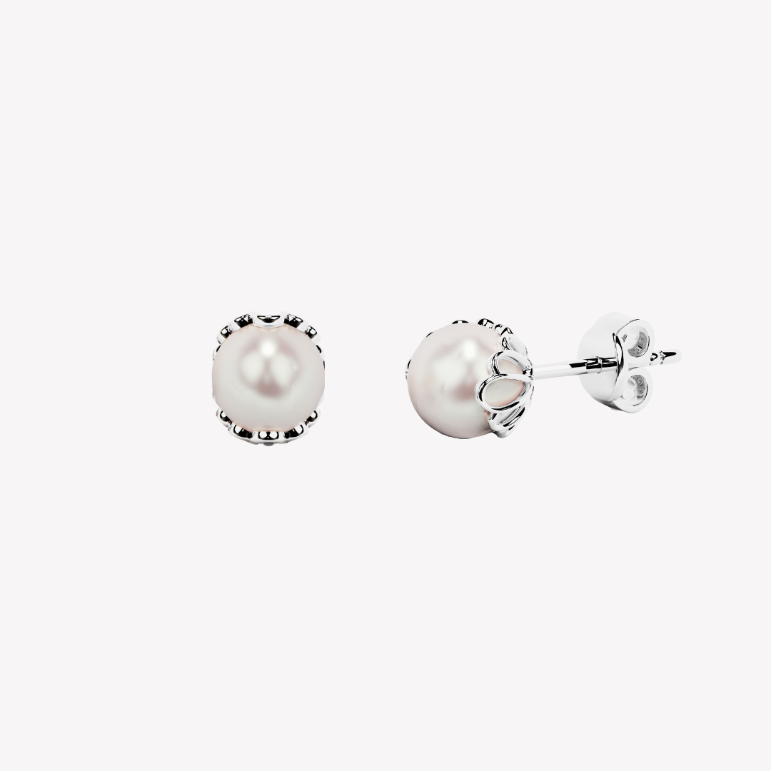 Rizen Jewelry shell encased pearl earring in sterling silver from the Becoming Collection.