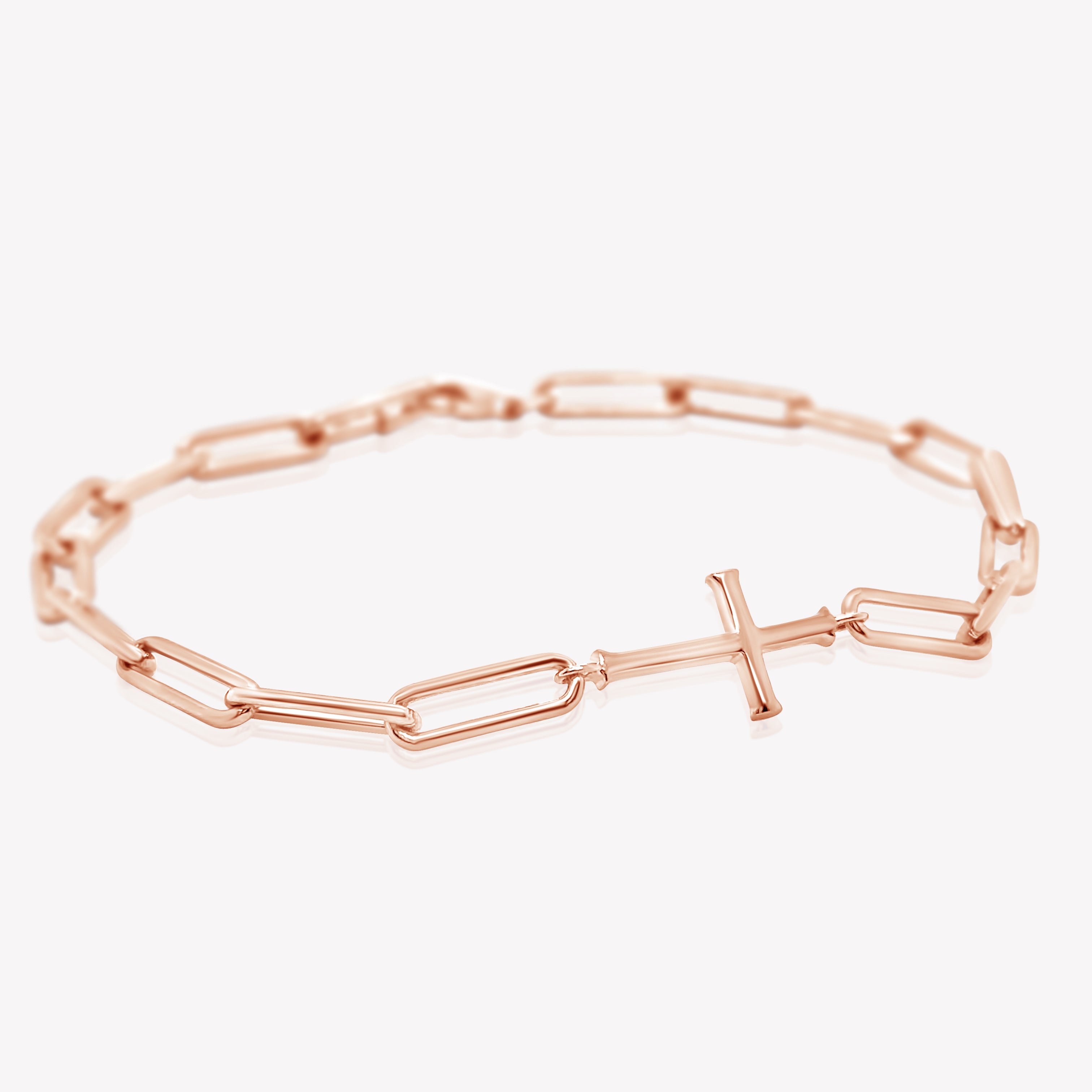 Chain breaker cross bracelet in 18k rose gold plated from the Calvary collection.
Inspirational Faith Jewelry for Women by Rizen Jewelry.
