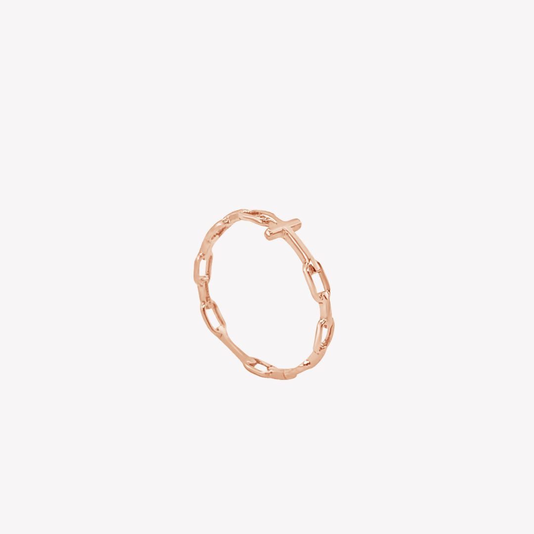 Chain breaker cross ring in 18k rose gold plated from the Calvary Collection. A timeless baptism gift by Rizen Jewelry.