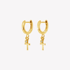 Rizen Jewelry Gold Vermeil Cross Huggie Hoop Earrings with white topaz stone dangle from the Calvary Collection. 