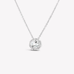 Rizen Jewelry Ebenezer solitaire white topaz necklace in sterling silver set in 7 prongs in a heptagon setting from the Chispa Collection.