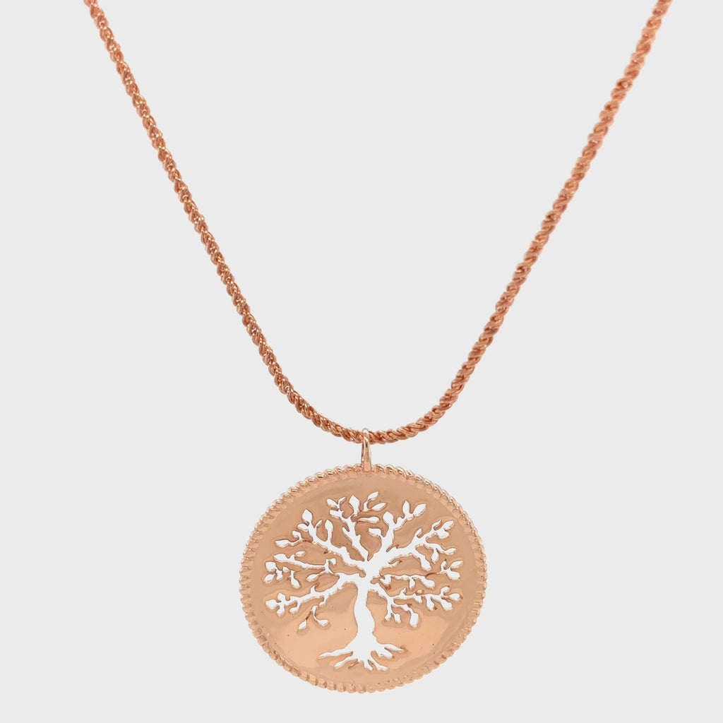 Rizen Jewelry Rooted Olive Tree Necklace in Rose Gold Vermeil metal. Tree design is intricately cut out of medallion pendant on a wheat chain.
