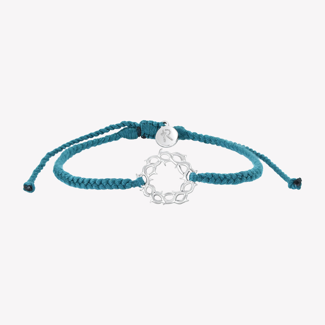 Adjustable christian friendship bracelet with silver crown of thorns pendant on hand braided azure blue cotton cords by Rizen Jewelry Made 4 Ministries collection. 