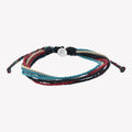 Rizen Jewelry Be Magnified Faithful multicord macrame bracelet. Cotton cords in black, garnet red, azure blue, and khaki with silver tag. Made 4 Ministries Collection. 