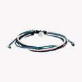 Christian friendship bracelet with black, azure blue and pink cords.  Silver Rizen Jewelry and Made 4 Ministries tag.