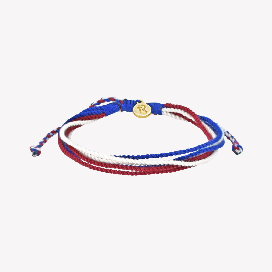 Christian Red White and Blue Be Magnified Peaceful Friendship bracelet with Gold Rizen Jewelry and Made 4 Ministries tag.