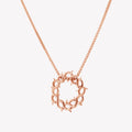 Rose gold vermeil Crown of Thorns Necklace by Rizen Jewelry. Box chain threaded through faith inspired crown of thorns pendant with Cross Tag.