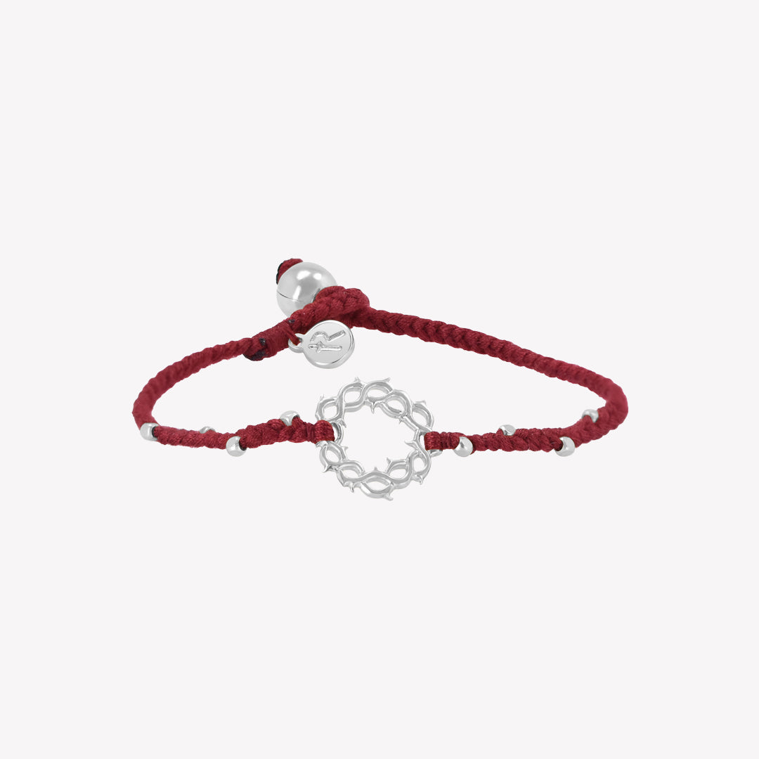 Garnet red friendship bracelet with silver crown of thorns pendant and 8 dainty beads with a pumpkin bead closure and a Rizen Jewelry Made 4 Ministries round tag.